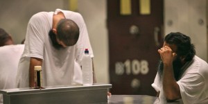 Detainees sit together inside Camp 6 detention facility at Guantanamo Bay U.S. Naval Base